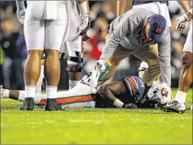  ?? KEVIN C. COX / GETTY IMAGES ?? The status of Kerryon Johnson, felled with an injured shoulder in Auburn’s Iron Bowl victory over Alabama, could be a key factor in the SEC title game.