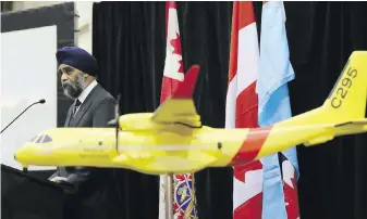  ??  ?? Defence Minister Harjit Sajjan in Trenton, Ont., in December 2016, announcing the federal government would spend $2.3 billion to replace the military's ancient search-and-rescue planes with 16 new aircraft. But COVID-19 means there will be further delays on replacemen­ts.