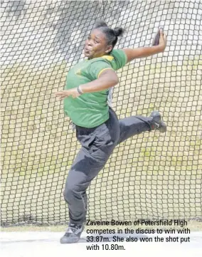  ??  ?? Zaveine Bowen of Petersfiel­d High competes in the discus to win with 33.87m. She also won the shot put with 10.80m.