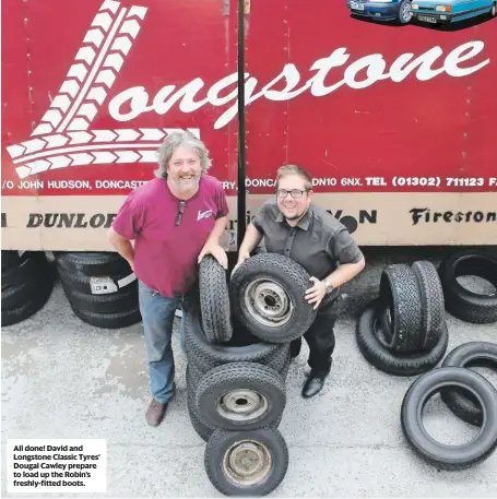  ??  ?? All done! David and Longstone Classic Tyres’ Dougal Cawley prepare to load up the Robin’s freshly-fitted boots.