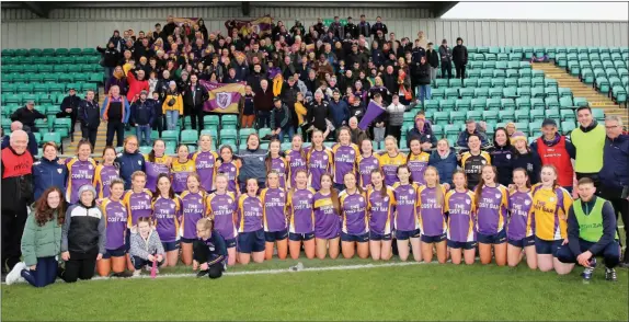  ?? ?? The Derrygonne­ly Harps players, management and supporters pictured in Mcgovern Park after Saturday’s win over Round Towers.