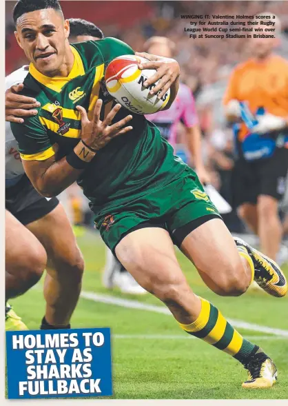  ??  ?? WINGING IT: Valentine Holmes scores a try for Australia during their Rugby League World Cup semi- final win over Fiji at Suncorp Stadium in Brisbane.