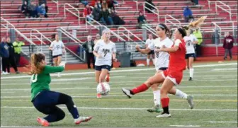  ?? MJ MCCONNEY - FOR DIGITAL FIRST MEDIA ?? Owen J. Roberts’ Bailey Hunt, right, takes a shot against Pope John Paul II goalkeeper Stacy Kormos.