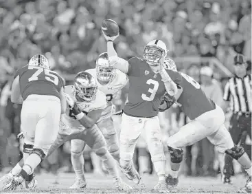  ?? Ezra Shaw / Getty Images ?? Stanford’s K.J. Costello (3) had a career-best four touchdown passes to lead the Cardinal past the Fighting Irish on Saturday night at Stanford Stadium in Palo Alto, Calif.