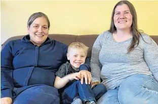  ?? ?? Ty Doucette, centre, was diagnosed with acute myeloid leukemia when he was seven months old. His parents Dianna, left, and Nichole never expected their son would be so sick at such a young age.