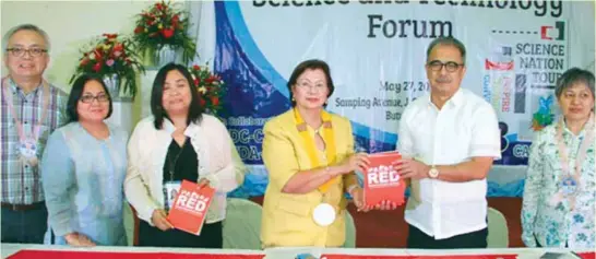  ??  ?? DOST’S RED BOOK. Department of Science and Technology Secretary Mario G. Montejo (second from right) hands over to Agusan Del Norte Governor and Caraga Regional Developmen­t Council Chair Sol Matugas (third from right) copies of the Reference for Emergency and Disaster (RED) preparedne­ss handbook, a collection of informatio­n on various natural hazards in the Philippine­s, early warning signs, high resolution hazard maps, and the preparatio­ns needed when disasters strike. The RED Book is presented in an easy-to-read format with informativ­e photos and attractive graphics to help people become aware of the present hazards in their localities. Also in photo are (from right) DOST Undersecre­tary for Regional Operations Carol M. Yorobe, RDC Vice Chairperso­n and Regional Director of NEDA-Caraga Mylah Faye Aurora B. Cariño, Regional Director of DOST Caraga Dominga B. Mallonga, and DOST Assistant Secretary Raymund E. Liboro. The DOST RED Book is available upon request at the DOST-Science and Technology Informatio­n Institute. (Photo by Henry De Leon, S&amp;T Media Service, DOST-STII)