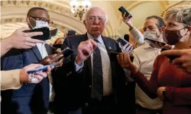  ?? Andrew Harnik/AP ?? Bernie Sanders leaves a Democratic strategy meeting at the Capitol on Tuesday. Photograph: