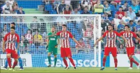  ??  ?? SÓLIDOS. Torres, Giménez, Koke, Savic y Oblak, ante el Getafe.