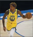  ?? TONY GUTIERREZ — THE ASSOCIATED PRESS ?? There was some speculatio­n that the Warriors would trade Kelly Oubre Jr. at the deadline, but they didn’t. Now, the team will likely try to re-sign him in the offseason.