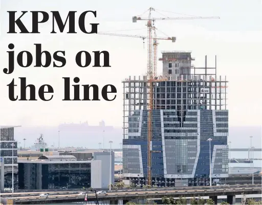  ?? PICTURE: HENK KRUGER ?? UNDER SCRUTINY: KPMG Place (centre) is a new R400 million developmen­t on the Foreshore. The embattled audit firm looks set for more stormy days with threats of lawsuits .