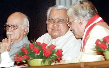  ??  ?? Former prime minister Atal Behari Vajpayee with BJP veteran L.K. Advani (left) and RSS general secretary Bhaiyyaji Joshi.