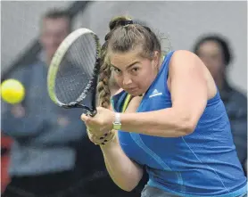  ?? PHOTO: GERARD O’BRIEN ?? Defending champion Megan Rogers, of Auckland, plays a backhand against Otago’s Libby Scott during the women’s singles final of the Otago Indoor Tennis Open at the Edgar Centre in Dunedin yesterday. Scott won 63, 62.