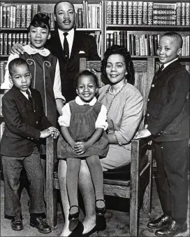  ?? ATLANTA JOURNAL-CONSTITUTI­ON 1966 ?? The King family gathers in 1966 for the last official portrait taken of the entire family, made in the study of Ebenezer Baptist Church in Atlanta. From left are Dexter King, Yolanda King, the Rev. Martin Luther King Jr., Bernice King, Coretta Scott...