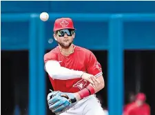  ?? JON BLACKER THE CANADIAN PRESS ?? Blue Jays shortstop Bo Bichette throws to first base to put out the Twins’ Gio Urshela.