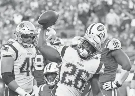  ?? ROBERT DEUTSCH/USA TODAY SPORTS ?? The Patriots’ Sony Michel celebrates a fourth-quarter TD against the Jets, his fifth of the season.