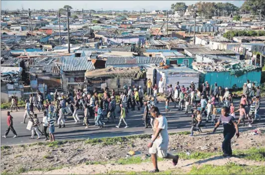  ??  ?? Accountabi­lity: Ward councillor­s need to hear what residents in their wards require, and relay the informatio­n to the municipal council to prevent service delivery protests such as this one, in the Sweet Home Farm section of Phillipi, Cape Town. Photo: David Harrison