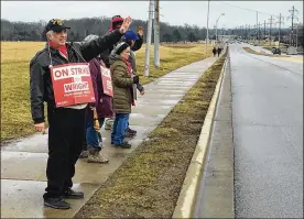  ?? MAX FILBY/ STAFF ?? Picketers stand outside an entrance to Wright State University on Colonel Glenn Highway. The AAUP-WSU has been on strike since Jan. 22.