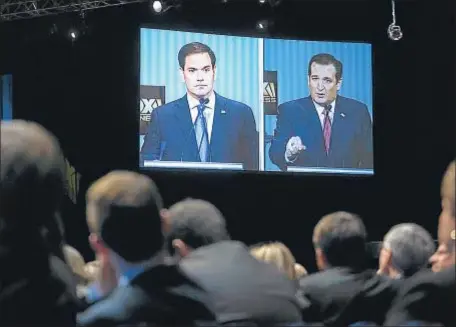  ?? ANDREW HARRER / BLOOMBERG ?? Marco Rubio y Ted Cruz, durante un debate electoral