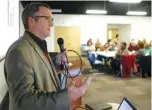  ?? STAFF PHOTO BY C.B. SCHMELTER ?? John Bridger, executive director of the Chattanoog­aHamilton County Regional Planning Agency, gives a presentati­on at the Chattanoog­a Housing Connection­s Conference at the Family Justice Center on Saturday.