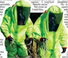  ??  ?? GRIM AFTERMATH:
Officials in hazmat suits at the spot in Salisbury where the stricken Skripals were found