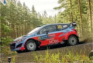  ?? PHOTO: VETTAS MEDIA. ?? The fast, flowing stages of Rally Finland have always been a hit with Kiwi WRC ace Hayden Paddon.