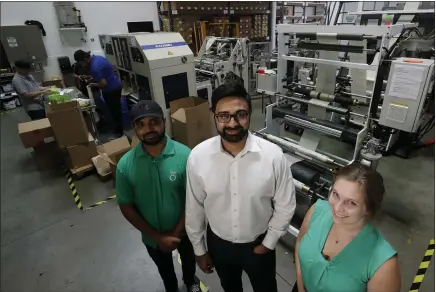  ?? PHOTOS BY CHRIS CARLSON — THE ASSOCIATED PRESS ?? Achyut Patel, director of operations, left, Rudy Patel, director of business developmen­t and Katrina Hart, business developmen­t coordinato­r of beyond Green say they had to move manufactur­ing from India to the U.S. because quality control didn’t meet the company’s needs.