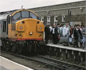  ?? AL PULFORD. ?? Additional trains to seaside towns could return as the railways recover from the pandemic. On July 30 1988, 37356 Grainflow stands at Great Yarmouth, having arrived with the 0722 from Newcastle.