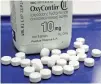  ?? TOBY TALBOT/ASSOCIATED PRESS FILE PHOTO ?? OxyContin pills in 2013. The FDA says its review of the opioids causing a nationwide epidemic is in the works. But there is skepticism from lawmakers, experts and advocates after years of delay.