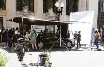  ?? Ned Gerard / Hearst Connecticu­t Media file photo ?? A crew films a scene for the Netflix movie “The Noel Diary” on Main Streeet in downtown Bridgeport on May 27, 2021.