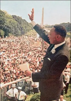  ?? ?? Dr. Martin Luther King Jr. waves to the crowd at the Lincoln Memorial before his “I Have a Dream” speech Aug. 28, 1963 in Washington, D.C.