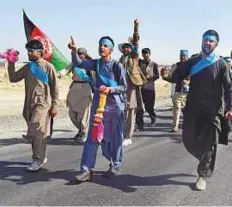  ?? AFP ?? The group of Afghan peace activists who have been walking from Helmand province to the capital Kabul.