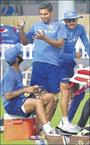  ?? PTI ?? India seamer Bhuvneshwa­r Kumar with team members during a practice session ahead of the third ODI against New Zealand, in Kanpur on Saturday.