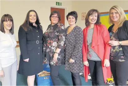  ??  ?? AM Vikki Howells, second from left, with members of ASD Rainbows