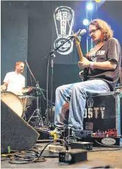  ?? PROVIDED]
[PHOTO ?? Hosty Duo, composed of guitarist, songwriter and vocalist Mike Hosty and drummer Mike “Tic Tack” Byers, will perform in Lions Park in Norman on Aug. 7.