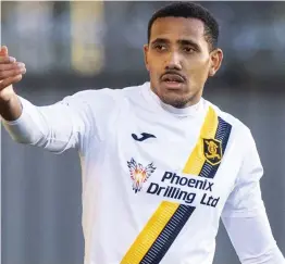  ?? ?? Partner: Cristian Montano, in action for Livingston FC