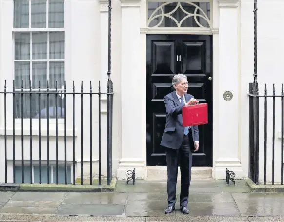  ??  ?? > The Resolution Foundation hailed Philip Hammond’s NICs rise as ‘welcome and progressiv­e’, while the IFS said it would go only a ‘small fraction’ of the way to redressing a tax system imbalance