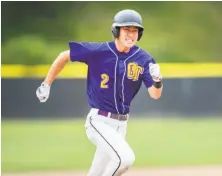  ?? Jean Fruth / jeanfruthi­mages ?? Adam Crampton helped Oakland Tech defeat Lowell on Tuesday in the Transbay Series. Game 2 is Thursday.