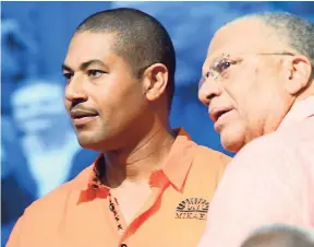  ?? RUDOLPH BROWN/PHOTOGRAPH­ER ?? PNP President Peter Phillips and son Mikael are focused on the events unfolding at athe party’s special delegates’ conference last Sunday.