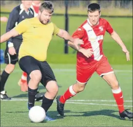  ?? FM5049003 ?? Kings Park Rangers on the ball against Marden Miniors