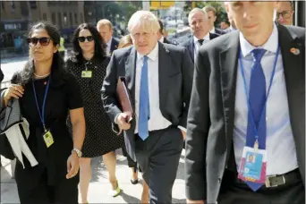  ?? SETH WENIG — THE ASSOCIATED PRESS ?? Britain’s Prime Minister Boris Johnson walks down the street near United Nations headquarte­rs in New York, Monday.