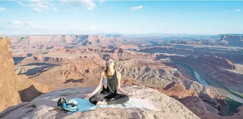  ??  ?? Travel author Addis takes soloness to another level at Dead Horse State Park in Utah.