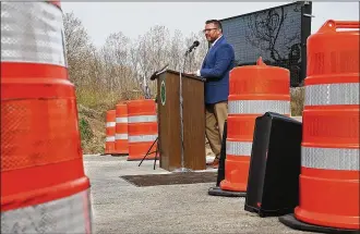  ?? BILL LACKEY / STAFF ?? Joshua Bowman, ODOT District 7 constructi­on engineer, talks about the constructi­on projects on area roadways Tuesday during the 2021 ODOT constructi­on season kickoff in Springfiel­d.