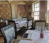  ??  ?? Mosaics that fashion designer Gianni Versace created for his dining room in his South Beach mansion are now the backdrop for the gourmet restaurant inside The Villa Casa Casuarina.