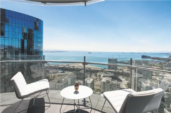  ??  ?? The three-bedroom penthouse includes a terrace overlookin­g the South Beach neighborho­od and the bay.