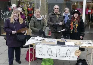  ??  ?? Save Our Record Office campaigner­s collect signatures from members of the public