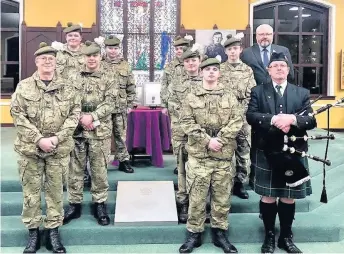  ??  ?? Service Representa­tives from the Royal Regiment of Scotland at the service