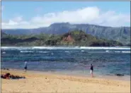  ?? JENNIFER MCDERMOTT — THE ASSOCIATED PRESS ?? This Feb, 14, 2018 photo shows Pu’u Poa Beach directly behind the St. Regis Princevill­e Resort on the north shore of Kauai, in Princevill­e, Hawaii.