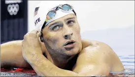  ?? MICHAEL SOHN / ASSOCIATED PRESS ?? Swimmer Ryan Lochte was charged by police in Brazil with filing a false robbery report over an incident during the Olympics in Rio de Janeiro. Under Brazilian law, the penalty for falsely filing a crime report is a maximum of 18 months in prison.