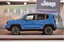  ?? Josh Edelson/ The Chronicle ?? A Jeep Renegade is displayed at the 2015 San Francisco Internatio­nal Auto Show. Jeep parent Stellantis has agreed to comply with state climate rules.