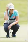  ?? Associated Press photo ?? Brooke Henderson of Canada lines up her putt on the 9th hole during the final round of the LPGA Classic at Whistle Bear Golf Club in Cambridge, Ontario on Sunday.